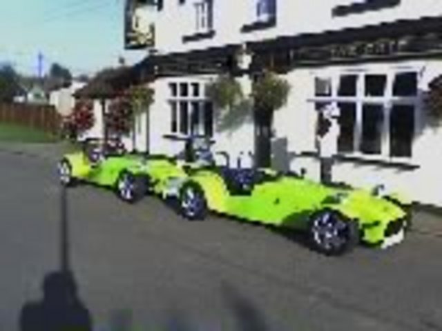 Rescued attachment both cars outside pub.jpg